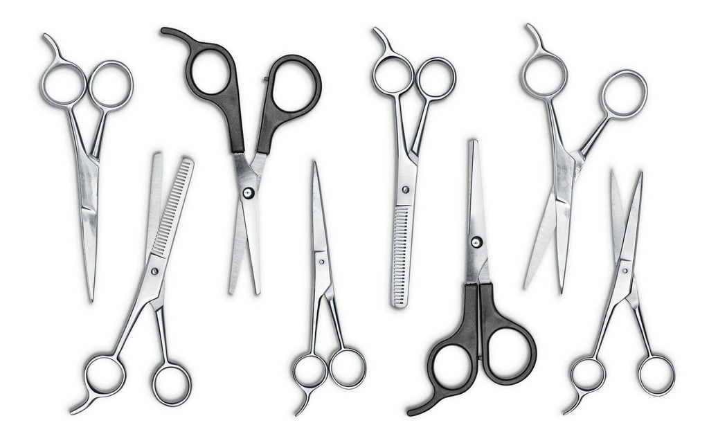 Sharpening of scissors or hairdressing scissors (sax)